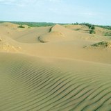 Zandheuvel met windrimpels
