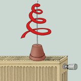 Papierschlange auf der Heizung