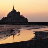 Mont Saint-Michel bij zonsondergang